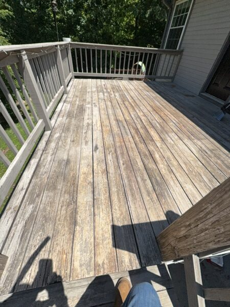 This comprehensive exterior cleaning project involved a full soft wash of the home's surfaces, a dedicated pressure wash of concrete hardscapes and retaining walls, and a gentle cleaning of the wood deck and mailbox to remove organic growth and restore the property's appearance.