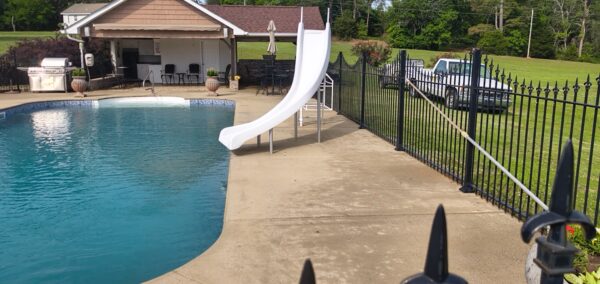 This concrete washing project in Chickamauga restored a home's pool deck and connecting walkway by applying a surface-safe detergent and using even-pressure surface washing to remove mold, mildew, and grime.