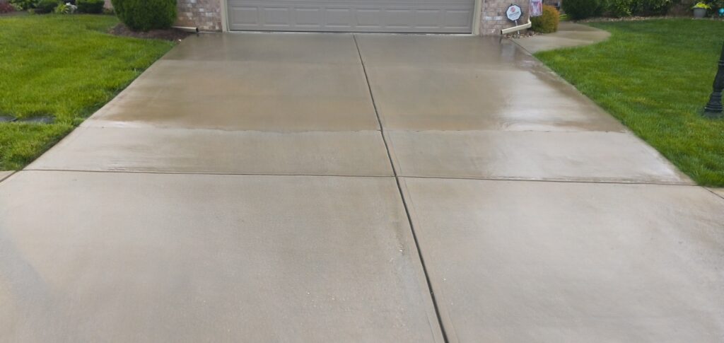 This concrete washing project in Middle Valley revived a driveway, front walkway, and back patio by treating mold and dirt with professional-grade detergents followed by a thorough, methodical power rinse.