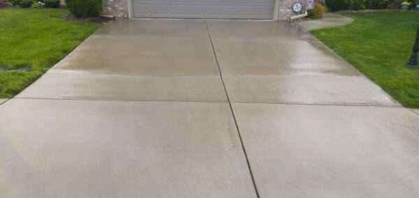 This concrete washing project in Middle Valley revived a driveway, front walkway, and back patio by treating mold and dirt with professional-grade detergents followed by a thorough, methodical power rinse.