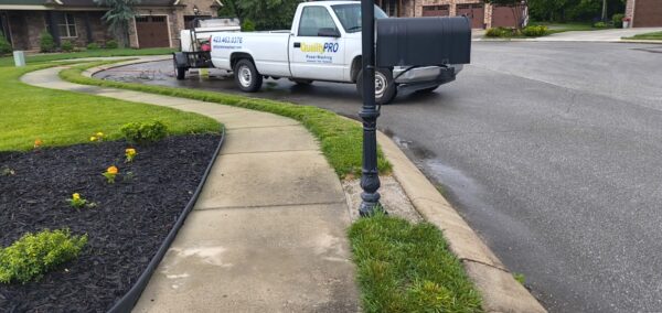 This project in Collegedale involved a comprehensive professional wash and detergent pre-treatment of a concrete driveway and adjacent sidewalk to thoroughly remove heavy dirt, mold, and mildew.