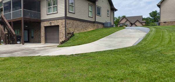 This project in Collegedale involved a comprehensive professional wash and detergent pre-treatment of a concrete driveway and adjacent sidewalk to thoroughly remove heavy dirt, mold, and mildew.