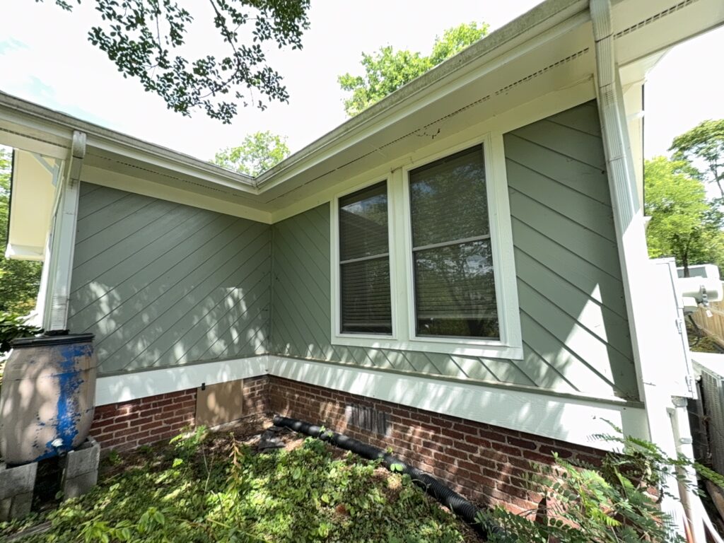 This project involved a comprehensive soft wash cleaning of a one-story residence, metal garage, and wood deck in Chattanooga to remove organic growth and dirt while preserving the integrity of all exterior surfaces.
