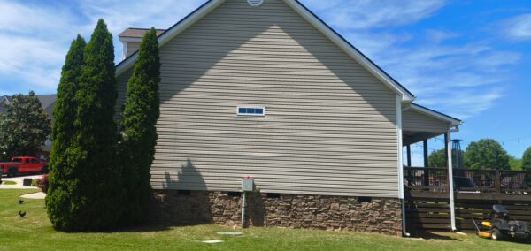 This project utilized low-pressure soft-wash methods to clean the entire two-story exterior envelope, a wood deck with stairs, and first-story exterior windows to remove organic growth and environmental buildup.