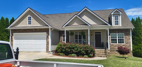 This project utilized low-pressure soft-wash methods to clean the entire two-story exterior envelope, a wood deck with stairs, and first-story exterior windows to remove organic growth and environmental buildup.