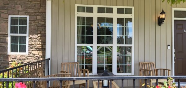 This project utilized low-pressure soft-wash methods to clean the entire two-story exterior envelope, a wood deck with stairs, and first-story exterior windows to remove organic growth and environmental buildup.
