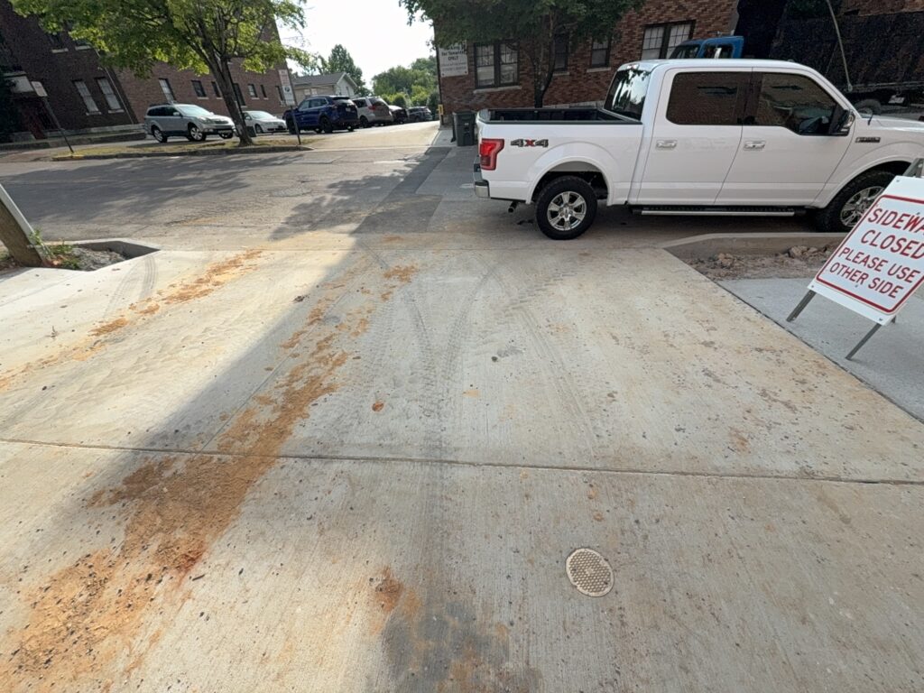 This project involved a comprehensive post-construction exterior cleaning of three commercial properties in Chattanooga, utilizing specialized detergents to pressure wash retaining walls, concrete aprons, porches, and multi-level composite decks.