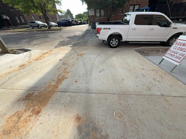 This project involved a comprehensive post-construction exterior cleaning of three commercial properties in Chattanooga, utilizing specialized detergents to pressure wash retaining walls, concrete aprons, porches, and multi-level composite decks.