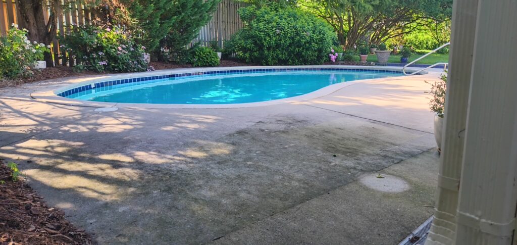 Professional pressure washing and detergent treatments were used to remove organic growth and grime from the pool deck, sidewalks, and entry paths of a Chattanooga home.