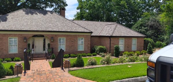 This seasonal maintenance project at a two-story Chattanooga residence involved thoroughly clearing leaves and debris from the roofline and leaf-guard-equipped gutter system, followed by a detailed exterior cleaning of the windows and both sides of several glass doors.