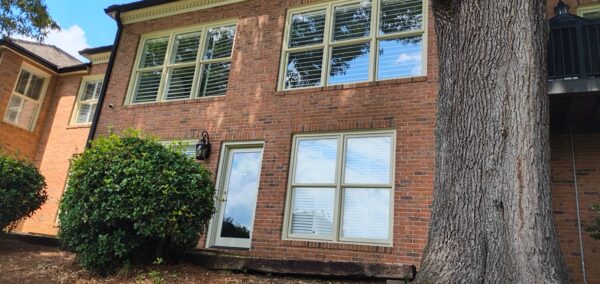This seasonal maintenance project at a two-story Chattanooga residence involved thoroughly clearing leaves and debris from the roofline and leaf-guard-equipped gutter system, followed by a detailed exterior cleaning of the windows and both sides of several glass doors.