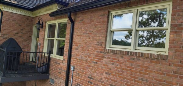 This seasonal maintenance project at a two-story Chattanooga residence involved thoroughly clearing leaves and debris from the roofline and leaf-guard-equipped gutter system, followed by a detailed exterior cleaning of the windows and both sides of several glass doors.