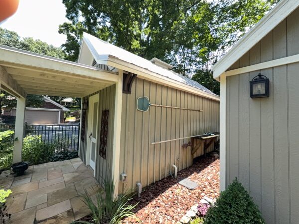 This project involved a comprehensive exterior refresh of a Chattanooga home using soft washing and surface cleaning to safely remove dirt, mold, and residue from the siding, gutters, porches, concrete walkways, brick retaining walls, entryway columns, wooden swing, and stone pool deck.