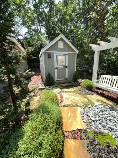 This project involved a comprehensive exterior refresh of a Chattanooga home using soft washing and surface cleaning to safely remove dirt, mold, and residue from the siding, gutters, porches, concrete walkways, brick retaining walls, entryway columns, wooden swing, and stone pool deck.