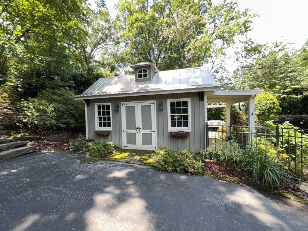 This project involved a comprehensive exterior refresh of a Chattanooga home using soft washing and surface cleaning to safely remove dirt, mold, and residue from the siding, gutters, porches, concrete walkways, brick retaining walls, entryway columns, wooden swing, and stone pool deck.