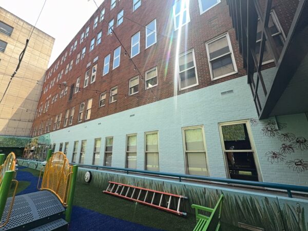 This project encompassed an exterior refresh of a Chattanooga commercial property through power washing structural surfaces, repainting pedestrian bridge handrails, pressure washing concrete areas, and hand-cleaning second-story windows.