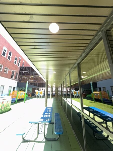 This project encompassed an exterior refresh of a Chattanooga commercial property through power washing structural surfaces, repainting pedestrian bridge handrails, pressure washing concrete areas, and hand-cleaning second-story windows.