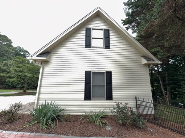 This project provided a comprehensive exterior maintenance service for a Cleveland home, including targeted soft washing of specific house elevations, a full gutter system cleaning, and a professional pressure washing of the driveway and sidewalk.