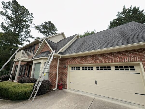 This project provided a comprehensive exterior maintenance service for a Cleveland home, including targeted soft washing of specific house elevations, a full gutter system cleaning, and a professional pressure washing of the driveway and sidewalk.