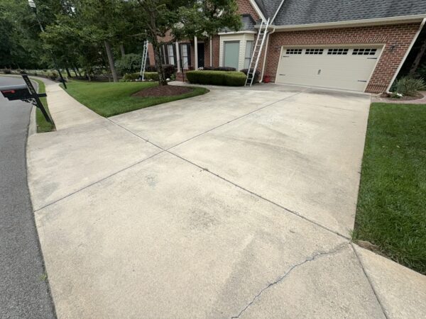 This project provided a comprehensive exterior maintenance service for a Cleveland home, including targeted soft washing of specific house elevations, a full gutter system cleaning, and a professional pressure washing of the driveway and sidewalk.