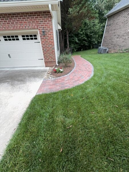 This project provided a comprehensive exterior maintenance service for a Cleveland home, including targeted soft washing of specific house elevations, a full gutter system cleaning, and a professional pressure washing of the driveway and sidewalk.
