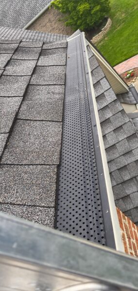 This project provided a comprehensive exterior maintenance service for a Cleveland home, including targeted soft washing of specific house elevations, a full gutter system cleaning, and a professional pressure washing of the driveway and sidewalk.