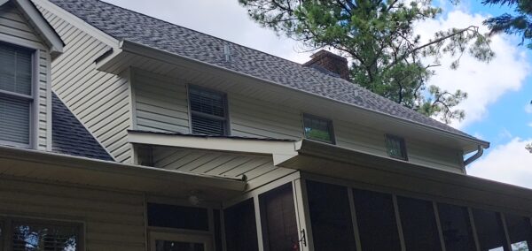 This project provided a comprehensive exterior maintenance service for a Cleveland home, including targeted soft washing of specific house elevations, a full gutter system cleaning, and a professional pressure washing of the driveway and sidewalk.