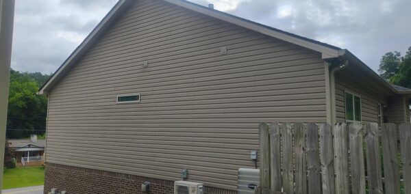 This project involved a comprehensive exterior refresh of a two-story Chattanooga home, including a soft-wash house cleaning with a mold warranty, a driveway concrete wash, gutter debris removal, and exterior window cleaning to restore both curb appeal and functionality.