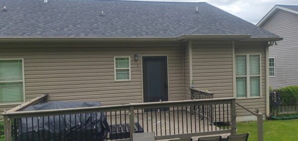 This project involved a comprehensive exterior refresh of a two-story Chattanooga home, including a soft-wash house cleaning with a mold warranty, a driveway concrete wash, gutter debris removal, and exterior window cleaning to restore both curb appeal and functionality.