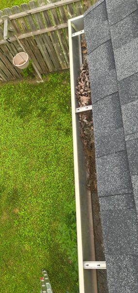 This project involved a comprehensive exterior refresh of a two-story Chattanooga home, including a soft-wash house cleaning with a mold warranty, a driveway concrete wash, gutter debris removal, and exterior window cleaning to restore both curb appeal and functionality.