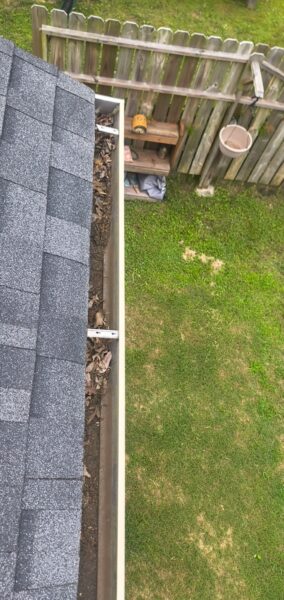 This project involved a comprehensive exterior refresh of a two-story Chattanooga home, including a soft-wash house cleaning with a mold warranty, a driveway concrete wash, gutter debris removal, and exterior window cleaning to restore both curb appeal and functionality.