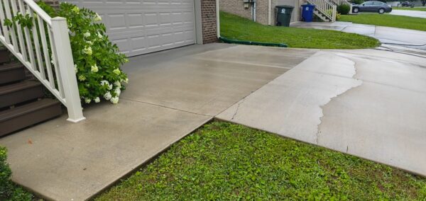 This project involved a comprehensive exterior refresh of a two-story Chattanooga home, including a soft-wash house cleaning with a mold warranty, a driveway concrete wash, gutter debris removal, and exterior window cleaning to restore both curb appeal and functionality.