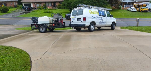 This project involved a comprehensive exterior refresh of a two-story Chattanooga home, including a soft-wash house cleaning with a mold warranty, a driveway concrete wash, gutter debris removal, and exterior window cleaning to restore both curb appeal and functionality.