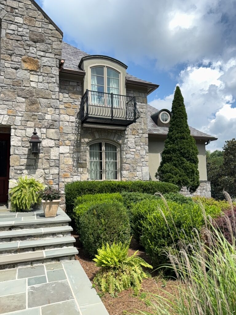 This project involved a comprehensive soft wash and power rinse of a two-story residence in Signal Mountain, including its siding, pool deck, stone fireplace, metal fencing, patio furniture, and multi-level brick, stone, and wood patios to remove mold, mildew, and environmental buildup.