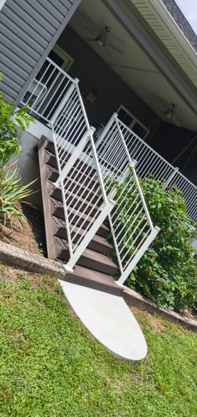 This project involved a comprehensive exterior soft wash of a one-story residence in Rising Fawn to remove organic buildup and meet a one-year mold warranty, alongside a detailed concrete cleaning of the front walkway and garage pad using pre-treatment and a surface washer.