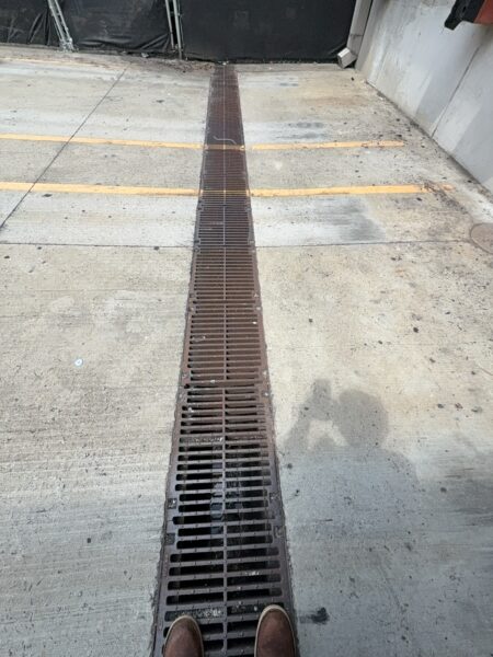 This project involved a comprehensive exterior cleaning of a dumpster area in Collegedale, including debris removal, drain clearing, and pressure washing to restore sanitation and improve appearance.