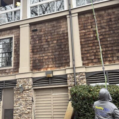 Brick and stone building window cleaning in action in chattanooga tn by qualitypro power washing